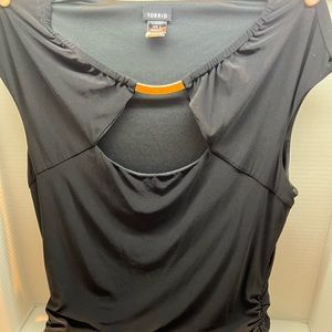 Black no sleeve dress shirt with gold loop on the neck